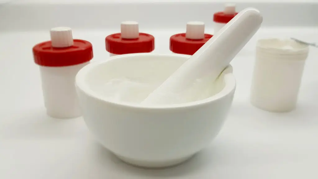 Ointment, mortar and container in the pharmacy laboratory